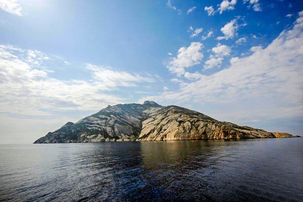 Poster Island of Monte Cristo silhoutte on sea - PIXERS.CO.NZ